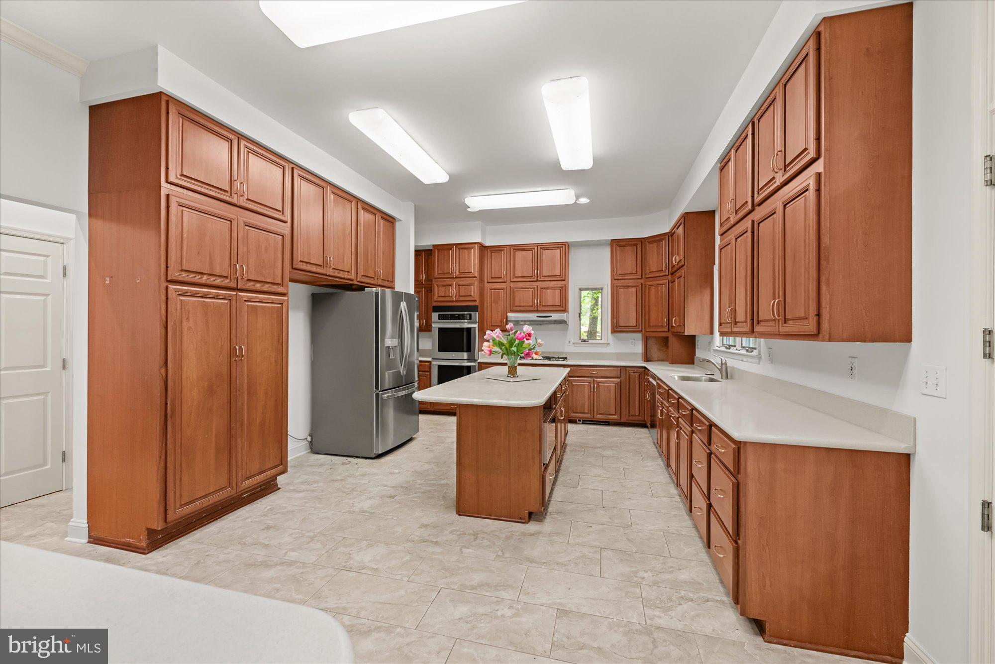 6013 Selvyn Road Bethesda, MD 20817 - Photo 13 of 54 Massive kitchen with lots of wood cabinets