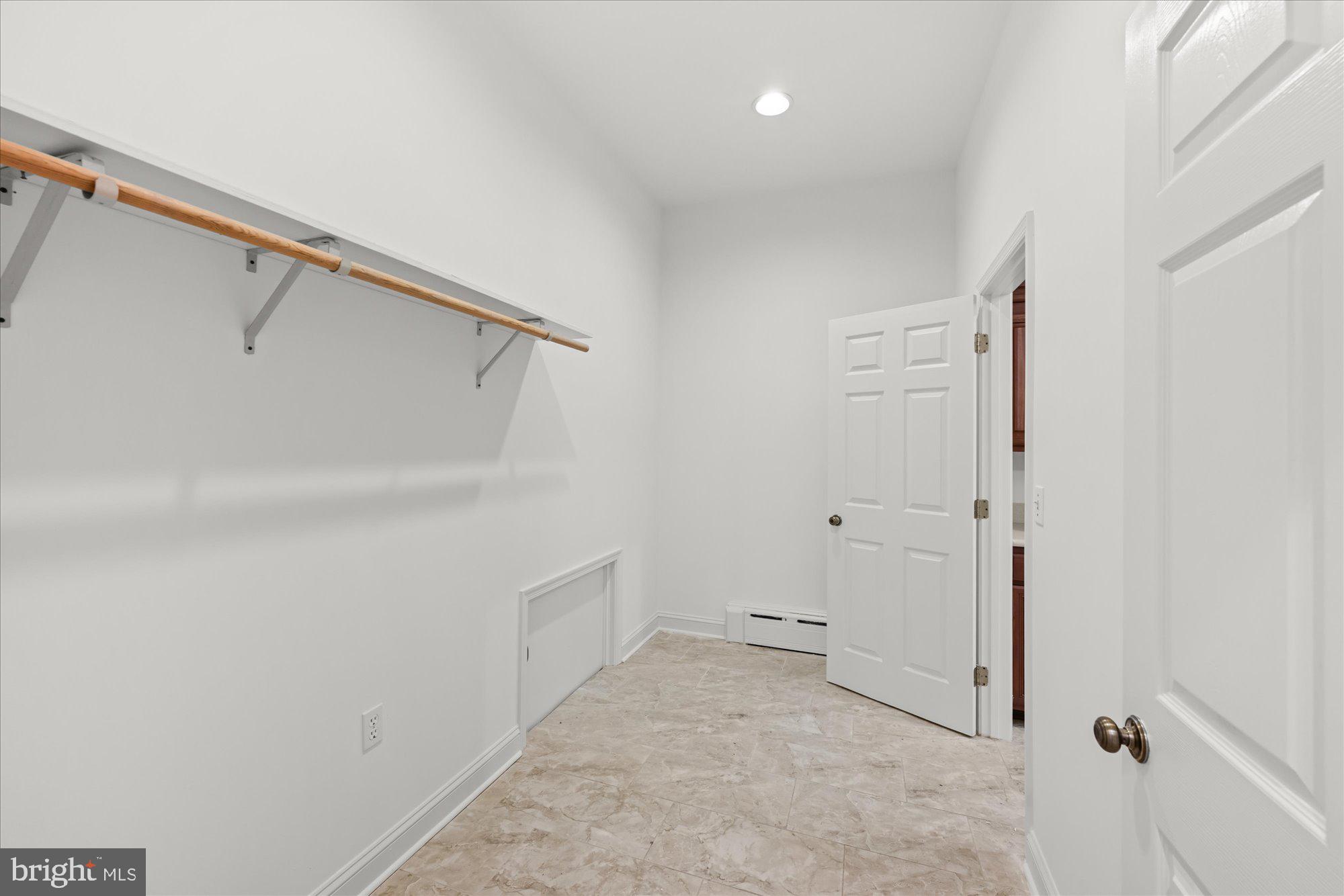 6013 Selvyn Road Bethesda, MD 20817 - Photo 17 of 54 Kitchen pantry with direct garage access!