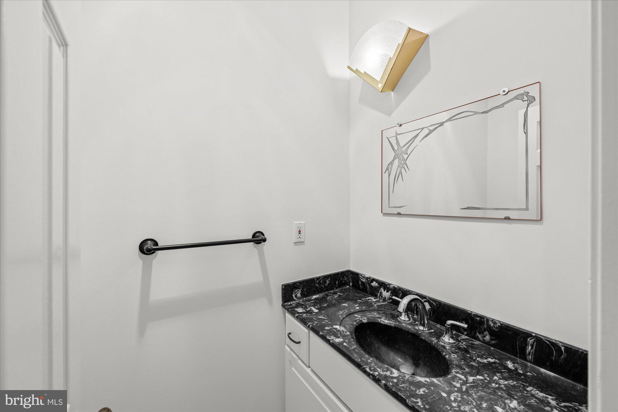 6013 Selvyn Road Bethesda, MD 20817 - Photo 18 of 54 Main level half-bath