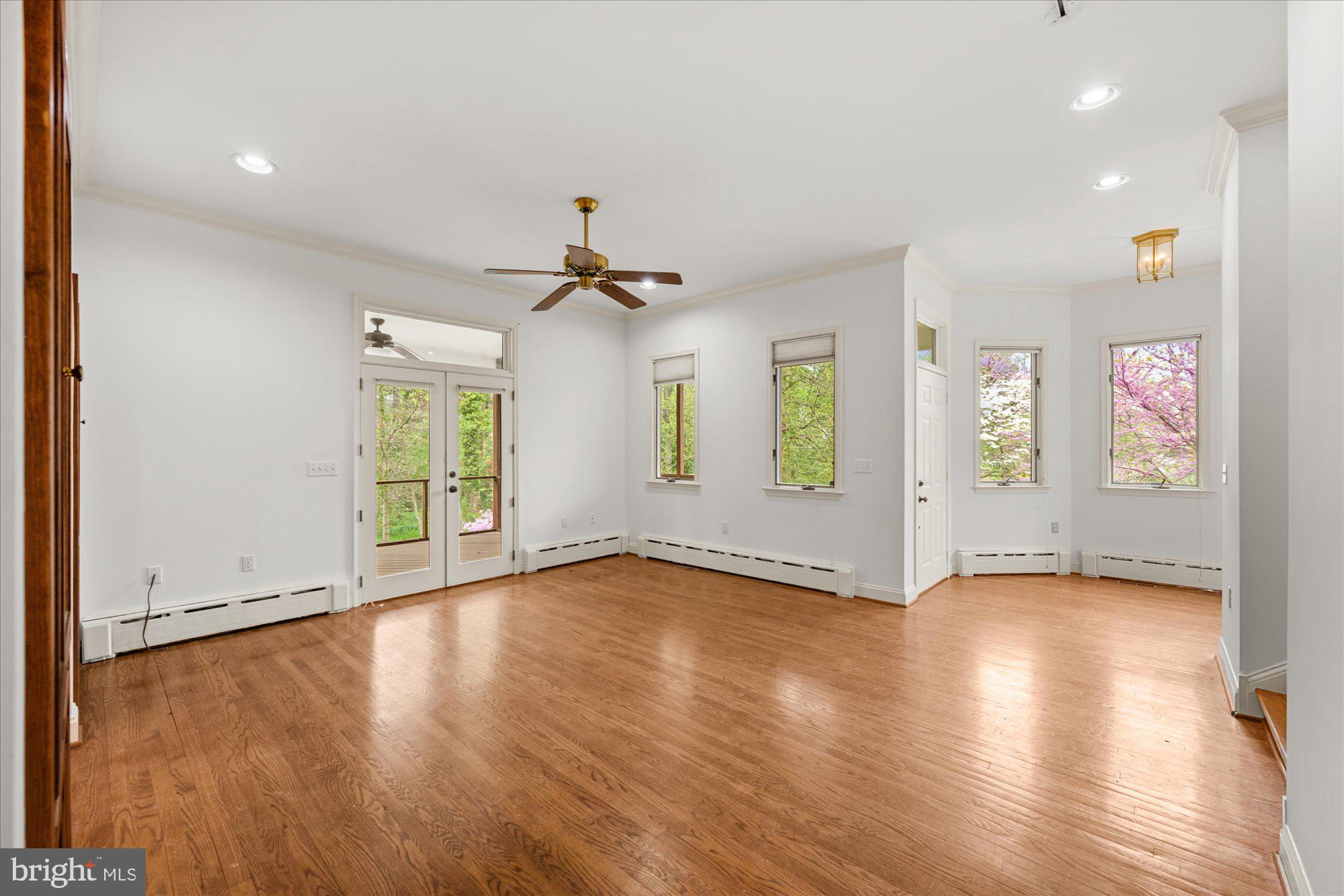 6013 Selvyn Road Bethesda, MD 20817 - Photo 6 of 54 Bright space and wood floors throughout