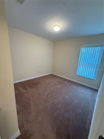 a bathroom with a shower and a toilet