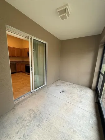 a kitchen with stainless steel appliances granite countertop a refrigerator sink and microwave