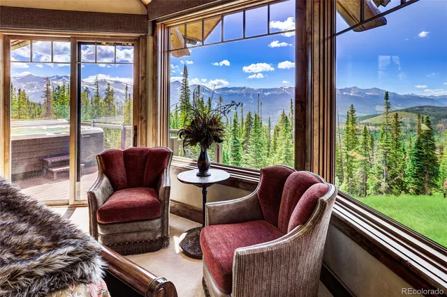a bathroom with a granite countertop bathtub and a sink