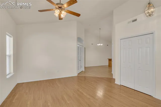 a view of an empty room with a window