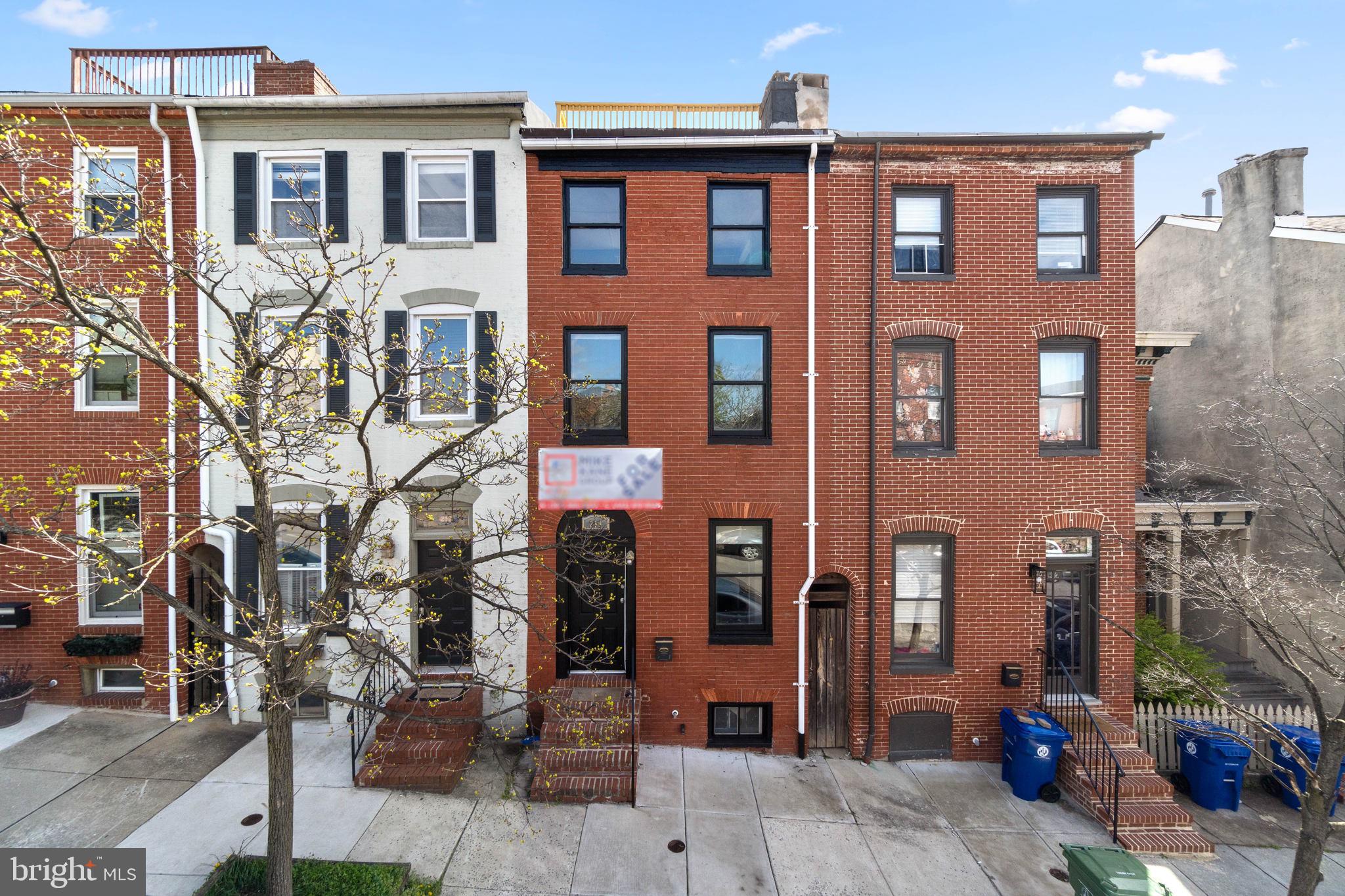219 South Washington Street Baltimore, MD 21231 - Photo 2 of 5 a front view of a multi story building