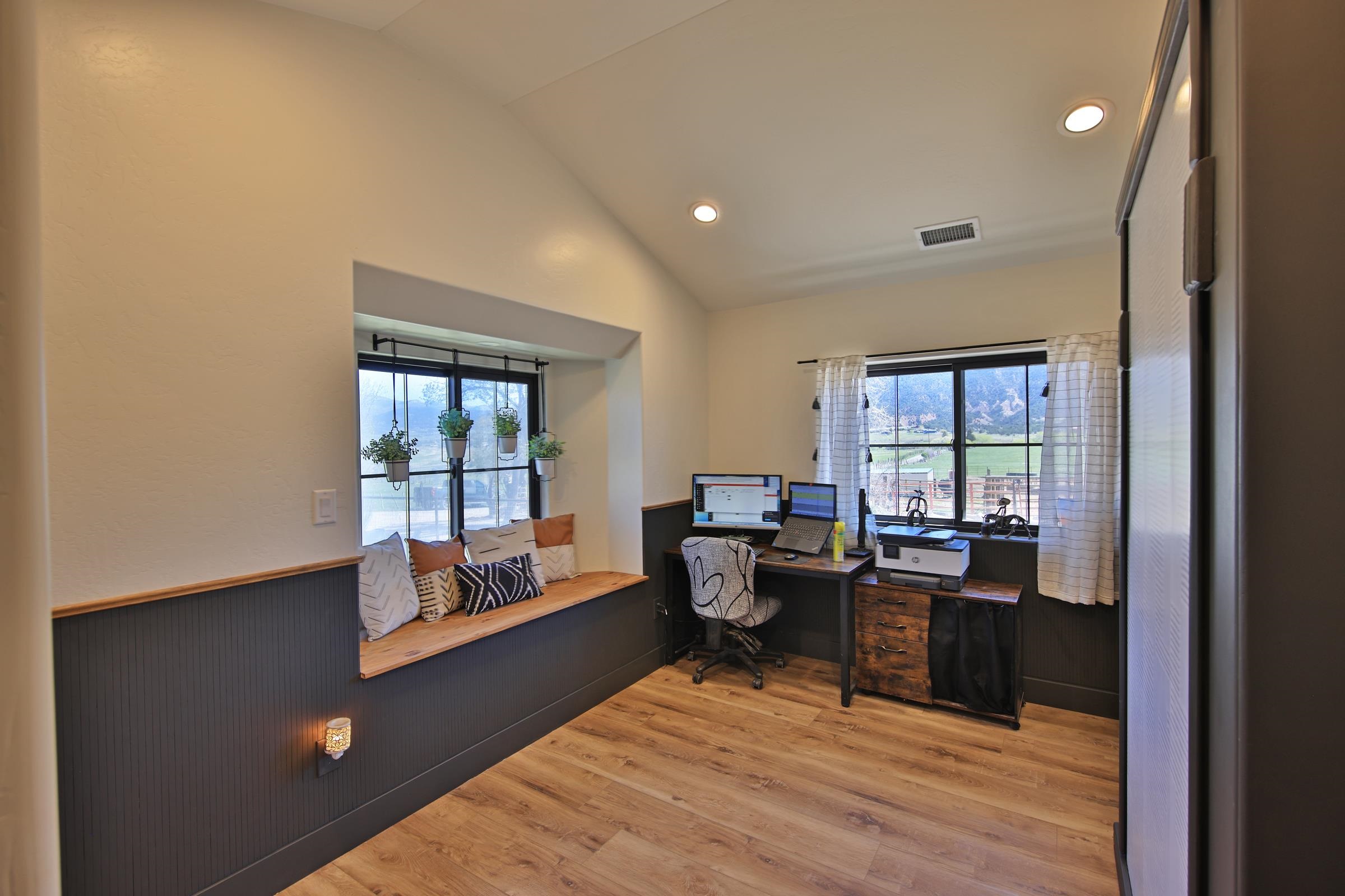 58749 Oe Road Collbran, CO 81624 - Photo 19 of 42 a living room with furniture and large window