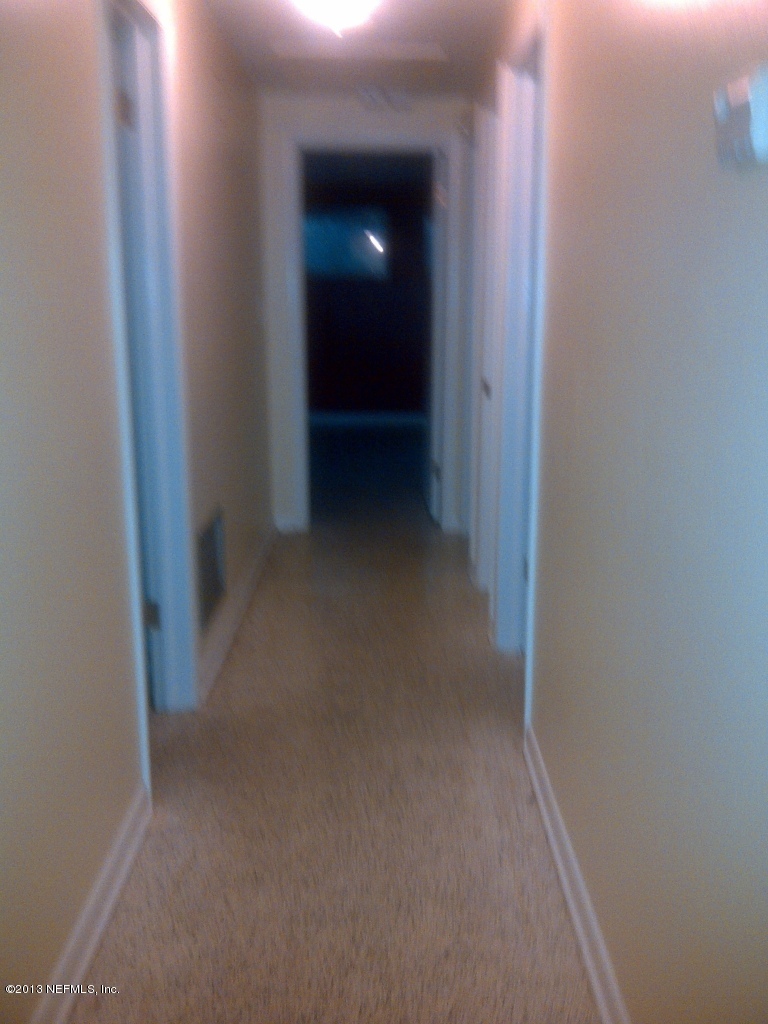 5009 Spring Glen Road Jacksonville, FL 32207 - Photo 7 of 16 a view of a hallway