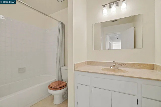 a bathroom with a sink toilet and a bathtub