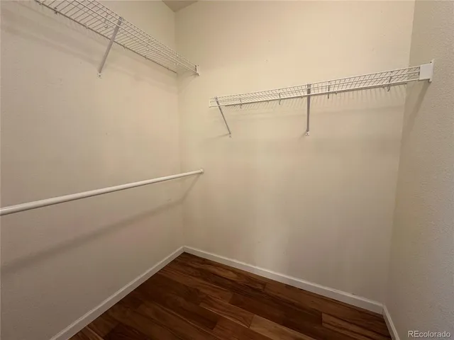 a view of a room with racks on the wall