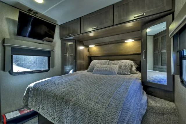 a bathroom with a sink and mirror