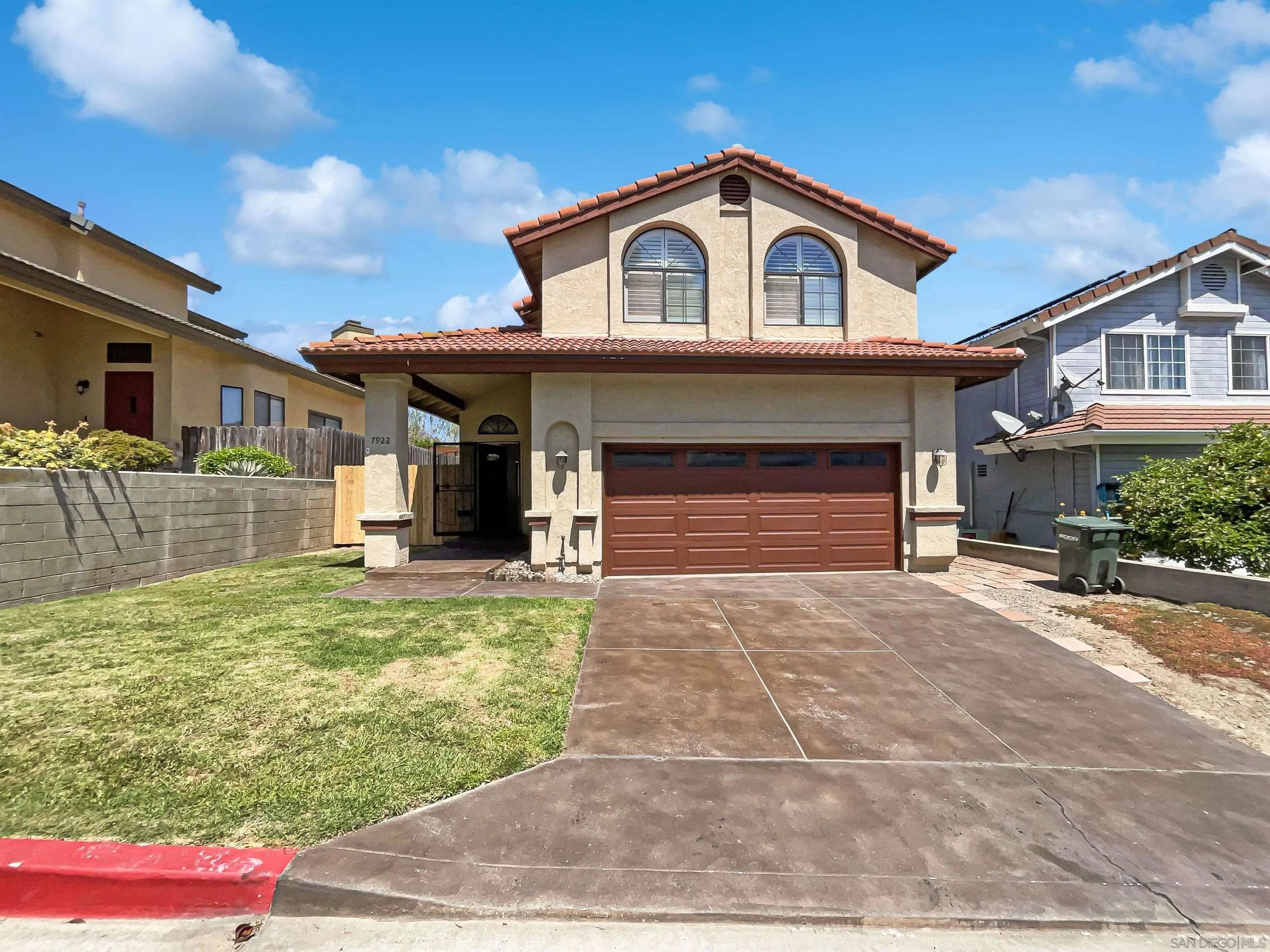 7922 Sunset Terrace Lemon Grove, CA 91945 - Photo 1 of 22 a front view of a house with garden