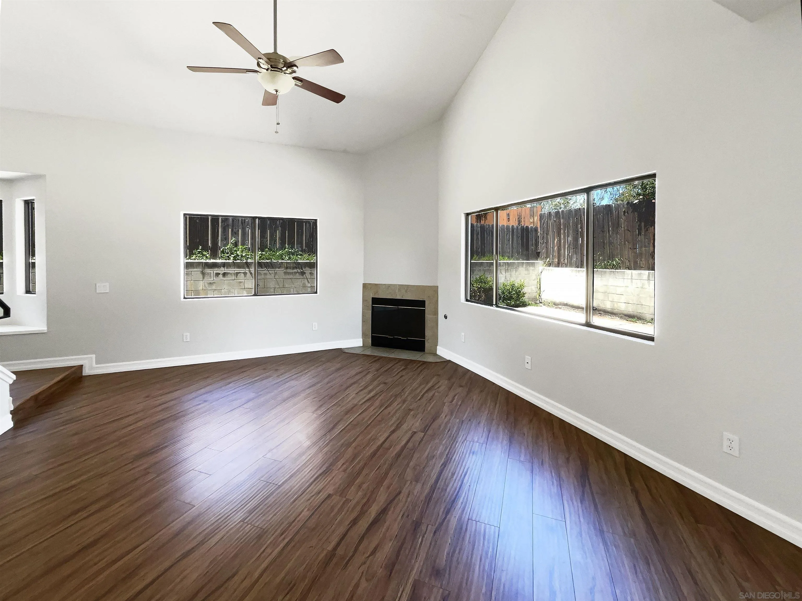 7922 Sunset Terrace Lemon Grove, CA 91945 - Photo 11 of 22 a view of an empty room with wooden floor and a window