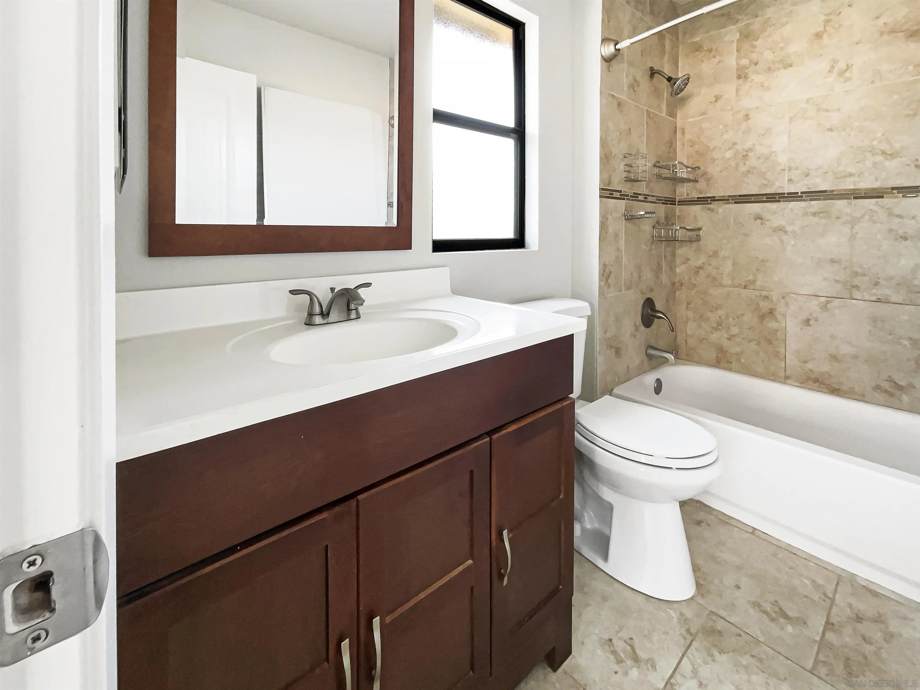 7922 Sunset Terrace Lemon Grove, CA 91945 - Photo 14 of 22 a bathroom with a sink a toilet and shower