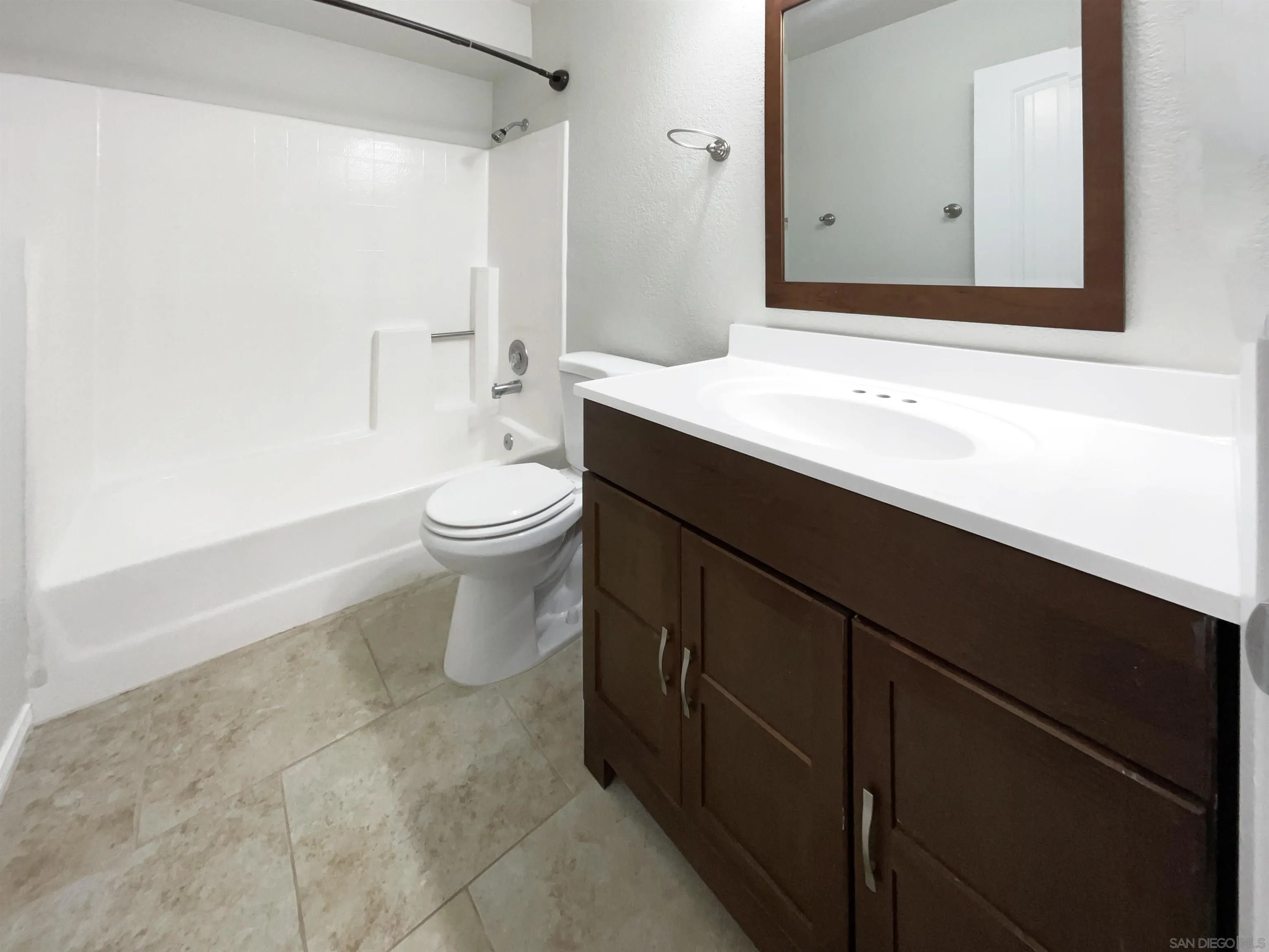 7922 Sunset Terrace Lemon Grove, CA 91945 - Photo 18 of 22 a bathroom with a sink a toilet and shower