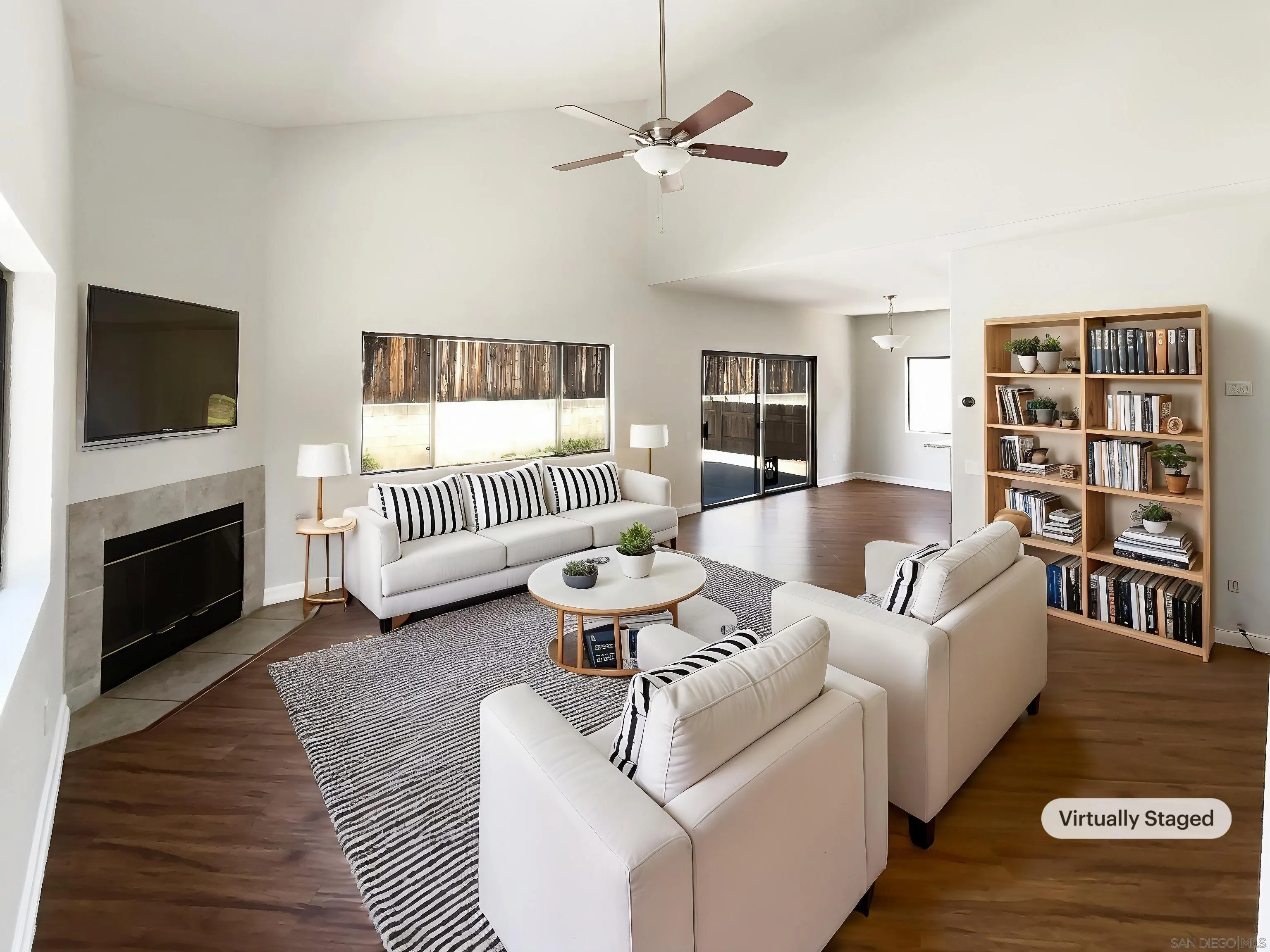 7922 Sunset Terrace Lemon Grove, CA 91945 - Photo 2 of 22 a living room with furniture or fireplace and a flat screen tv