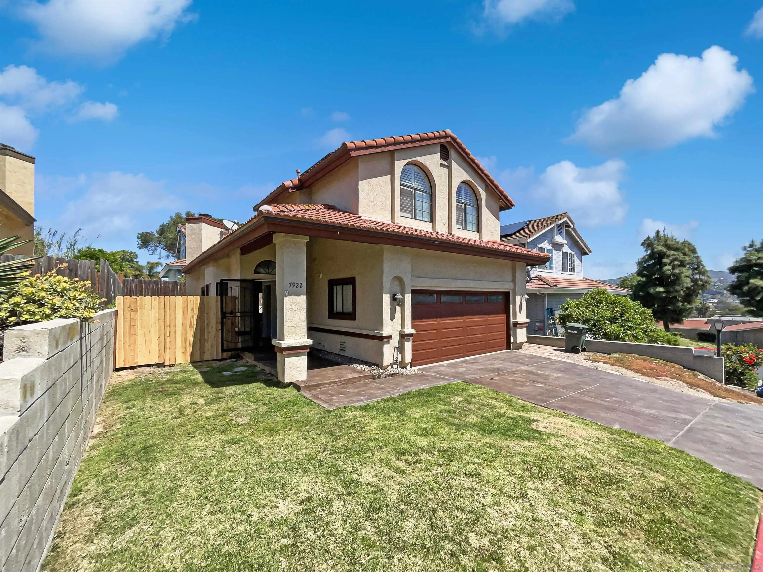 7922 Sunset Terrace Lemon Grove, CA 91945 - Photo 9 of 22 a front view of a house with garden