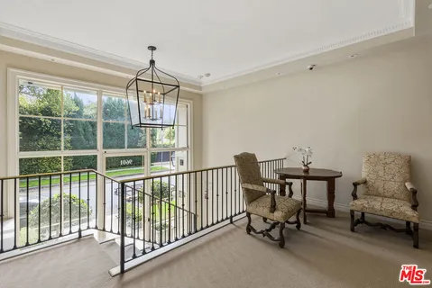 a view of a room with furniture window and a rug