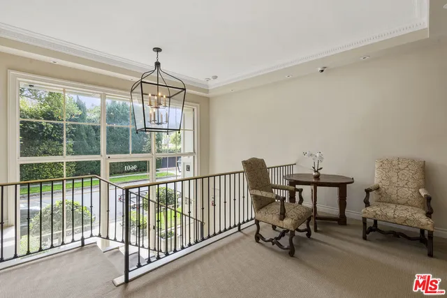 a view of a room with furniture window and a rug