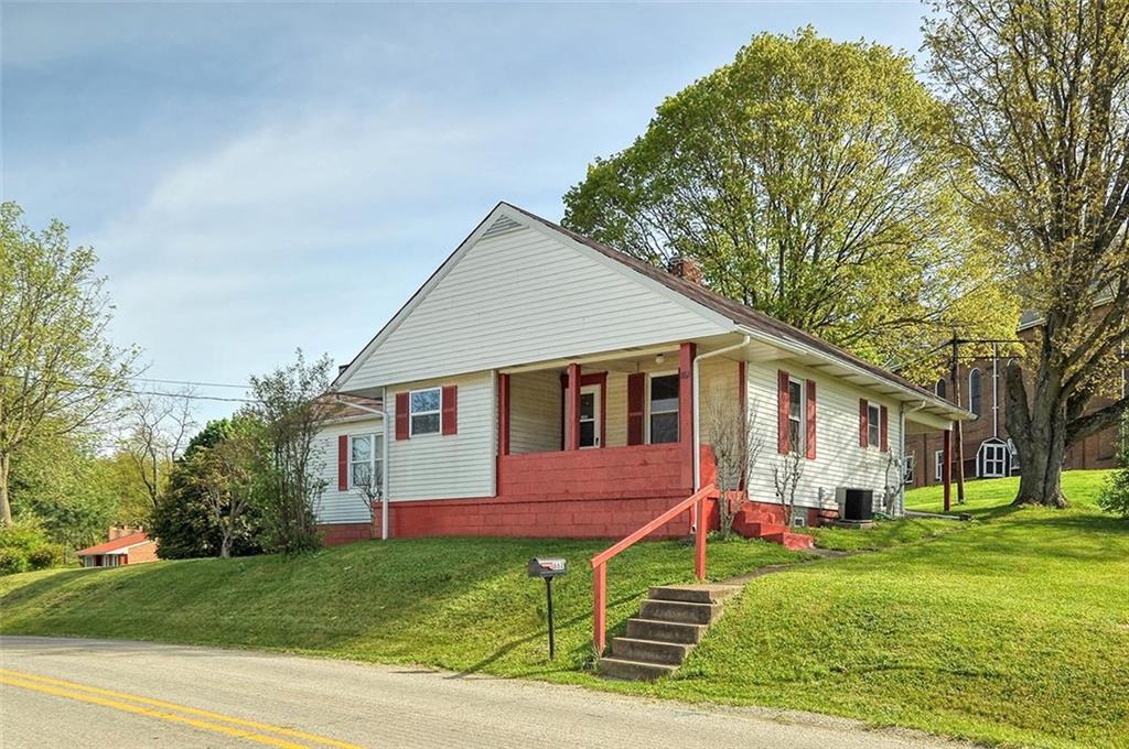 862 Candor Road Bulger, PA 15019 - Photo 2 of 19 a front view of a house with a yard