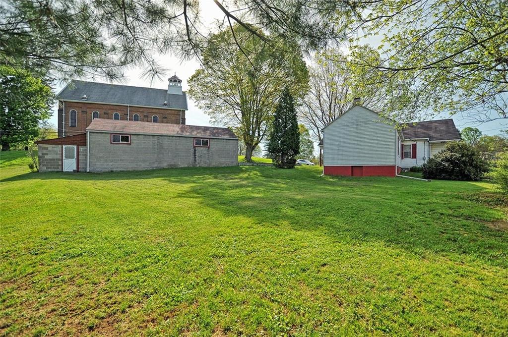 862 Candor Road Bulger, PA 15019 - Photo 3 of 19 a view of a house with a yard and large tree