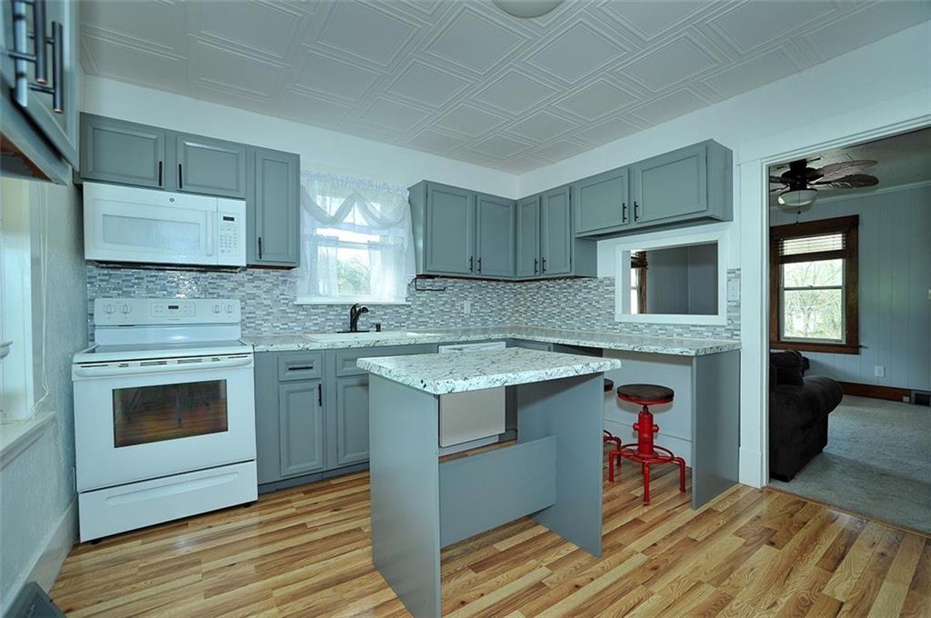 862 Candor Road Bulger, PA 15019 - Photo 6 of 19 a kitchen with a stove top oven and sink