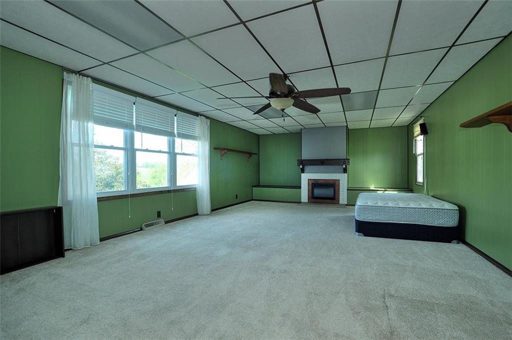 862 Candor Road Bulger, PA 15019 - Photo 9 of 19 a room with a window and a fireplace