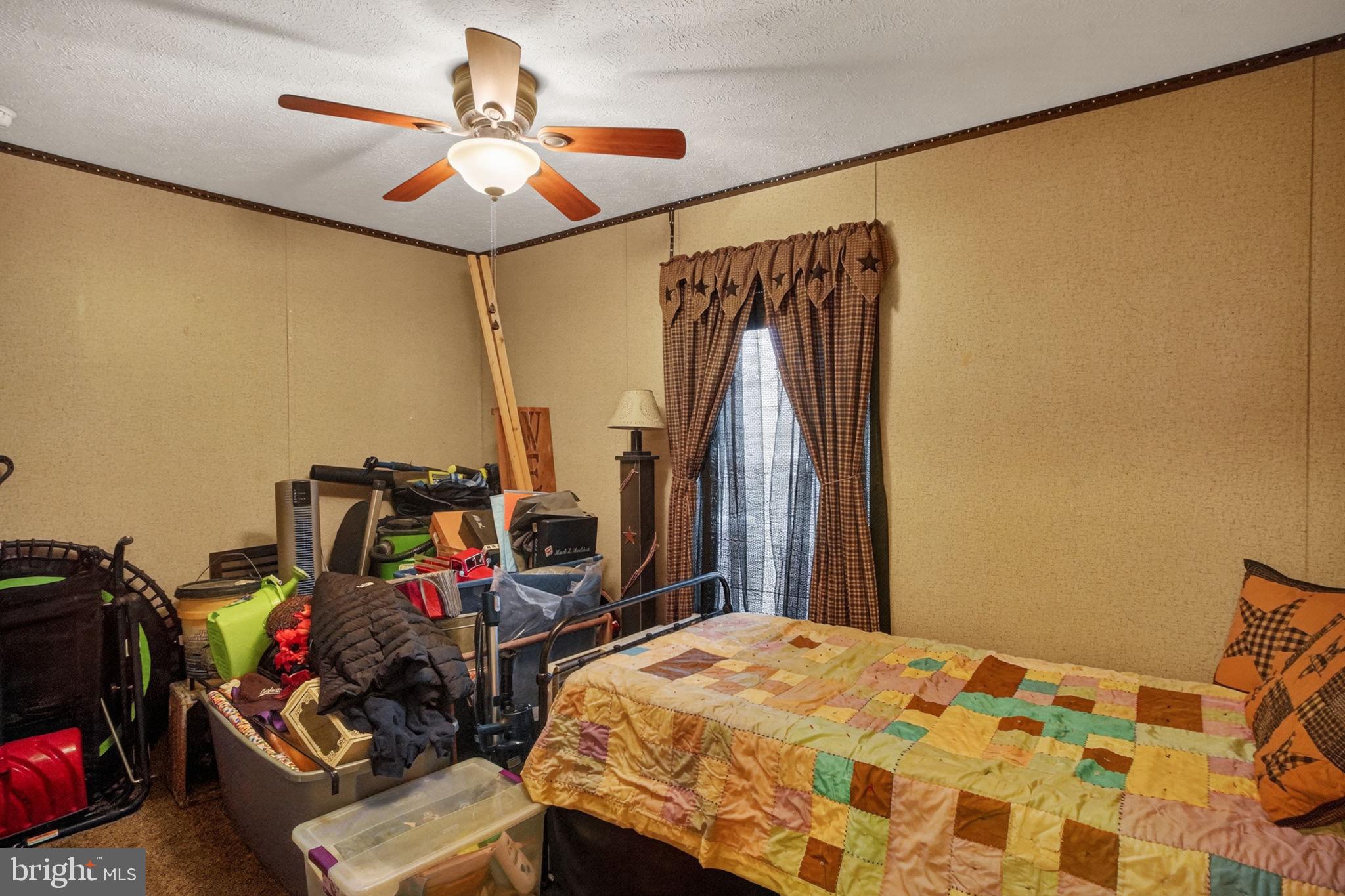 39 Country Club Road West Northampton, PA 18067 - Photo 13 of 26 a bedroom with bed and a chandelier