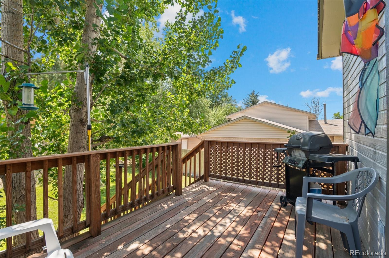 9648 Lane Street Thornton, CO 80260 - Photo 21 of 27 a view of a wrought iron stairs