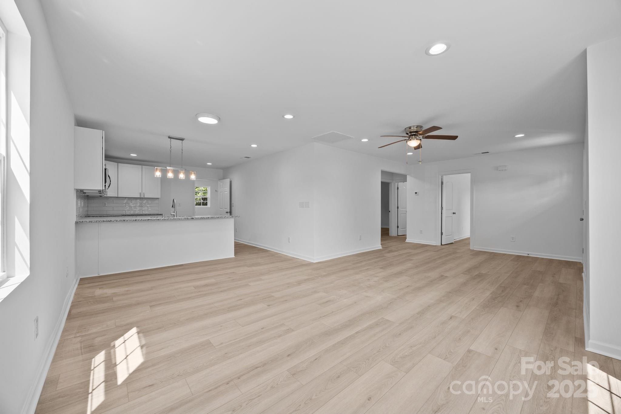 409 Shaver Street Salisbury, NC 28144 - Photo 11 of 39 a view of an empty room and kitchen view