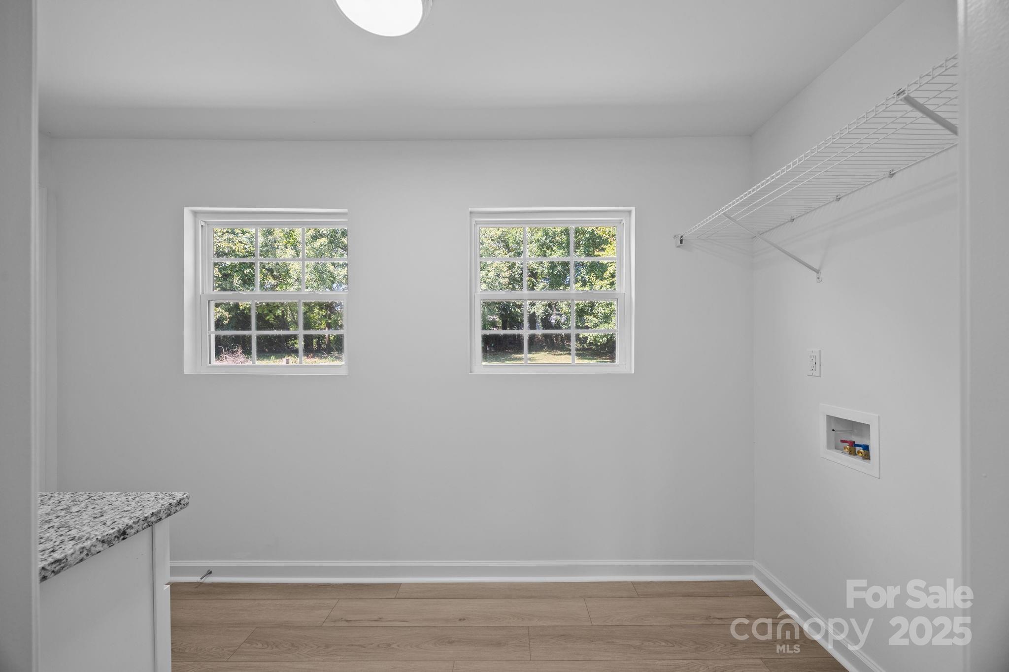 409 Shaver Street Salisbury, NC 28144 - Photo 17 of 39 an empty room with a window