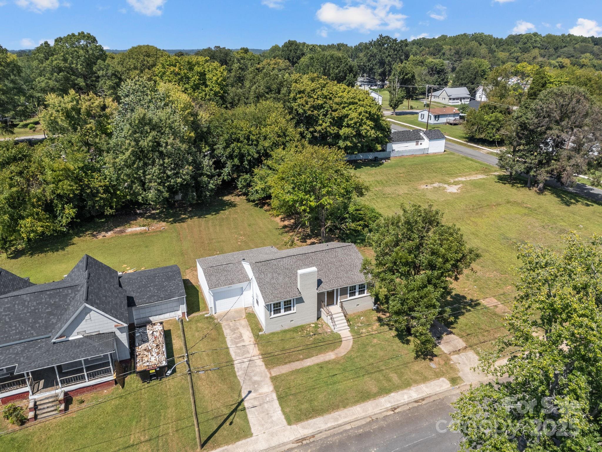409 Shaver Street Salisbury, NC 28144 - Photo 39 of 39 a view of an chairs and table in the patio