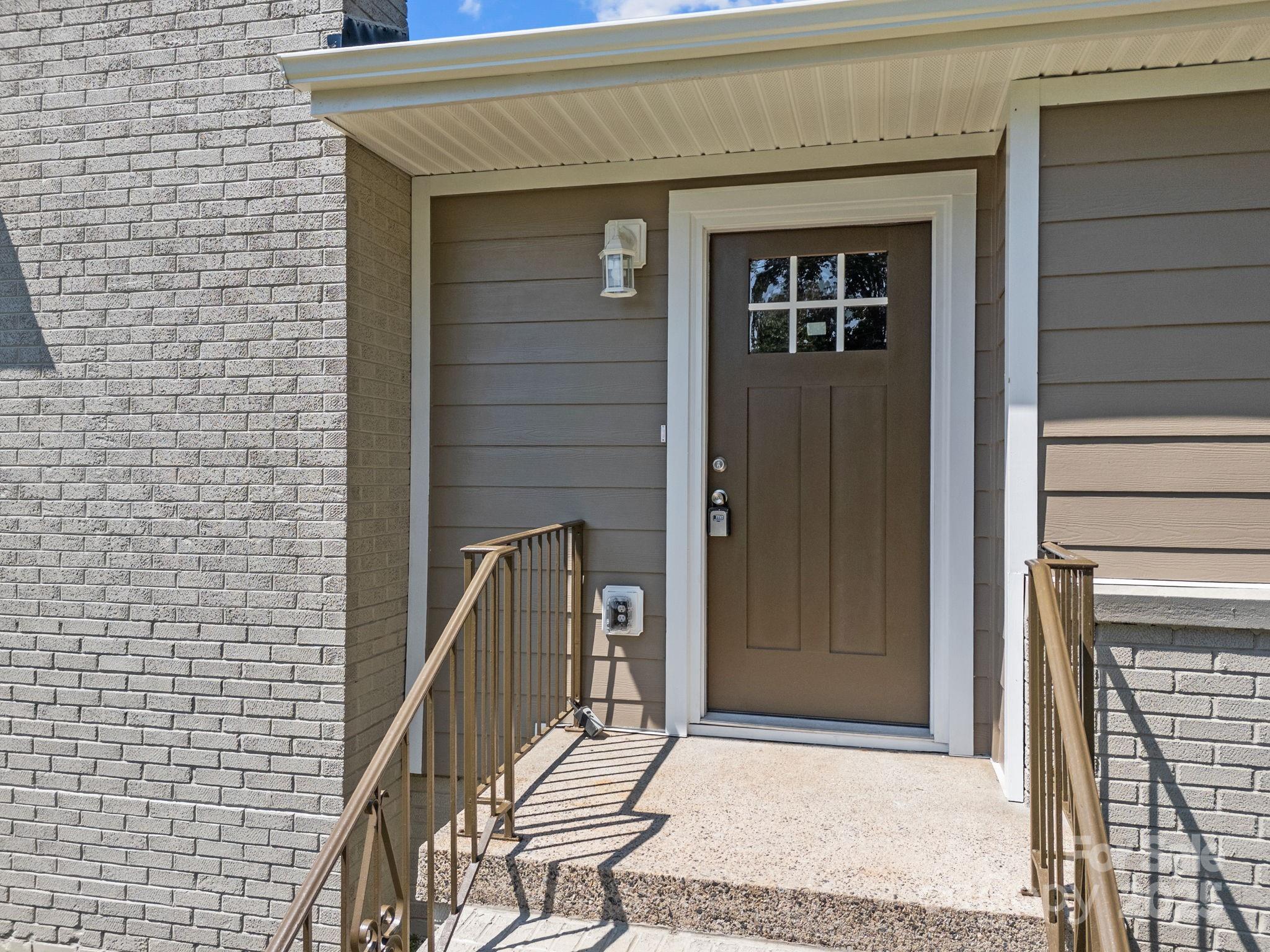 409 Shaver Street Salisbury, NC 28144 - Photo 6 of 39 a front view of a house with stairs