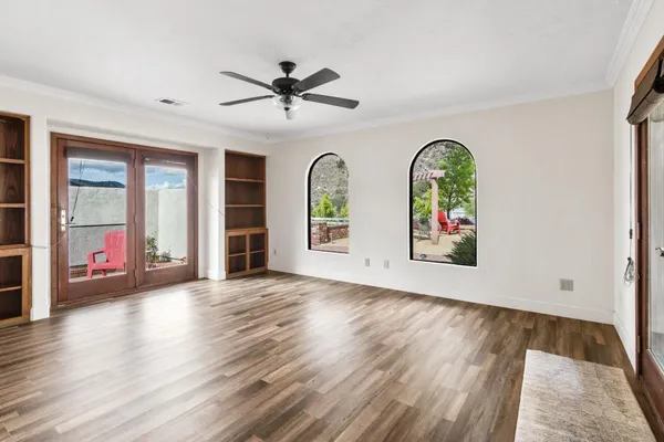 a view of an empty room with a window
