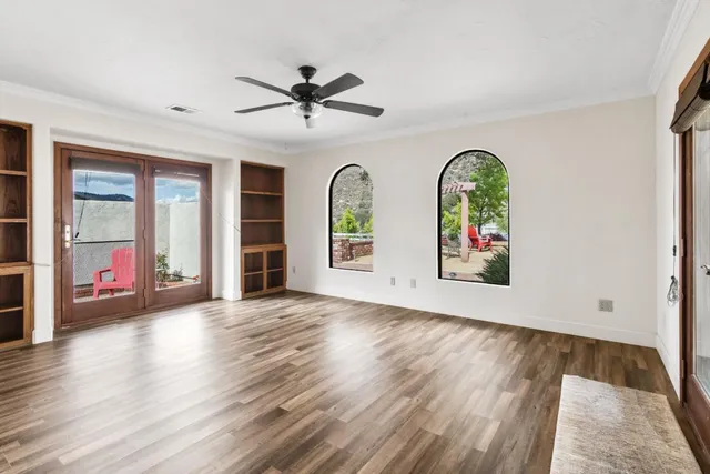 a view of an empty room with a window