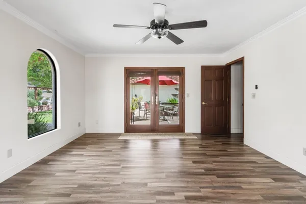 a view of workspace with wooden floor