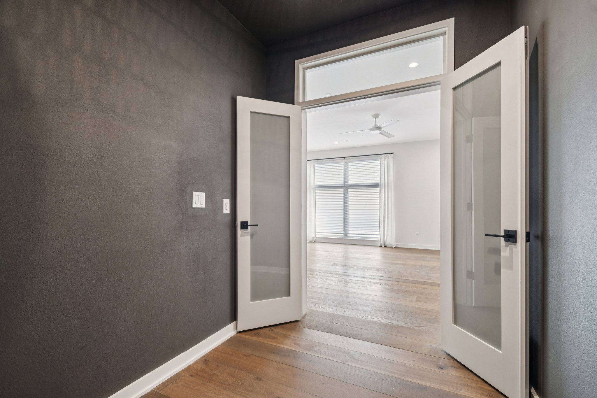 2518 Watkins Way Austin, TX 78746 - Photo 21 of 28 an empty room with wooden floor and closet