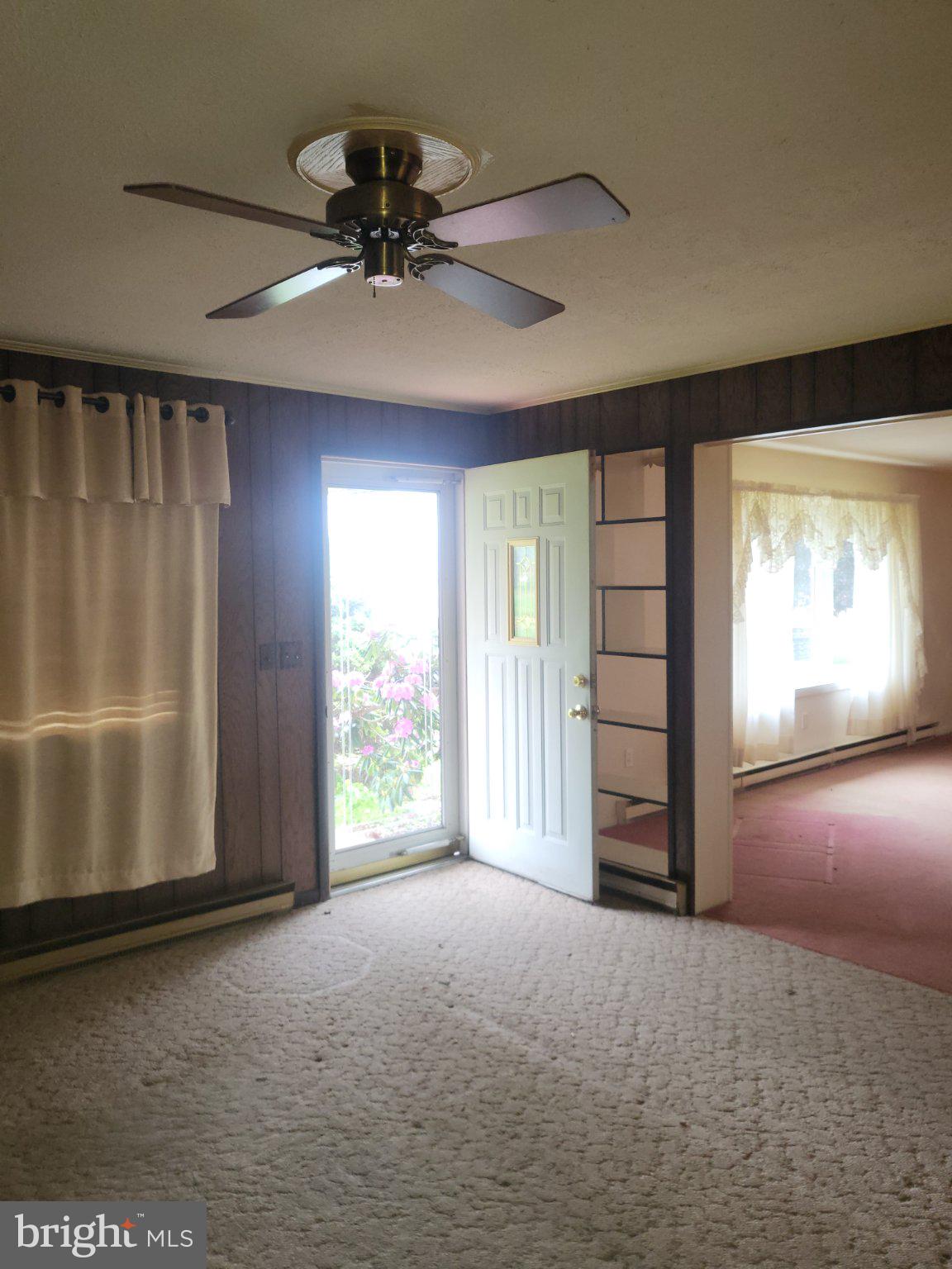 32 Sheetz Road Halifax, PA 17032 - Photo 20 of 20 a view of a livingroom with a ceiling fan and window