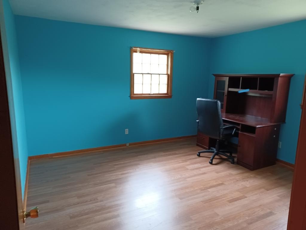 301 Lear Road Portland, TN 37148 - Photo 13 of 19 a view of a workspace with furniture and a window