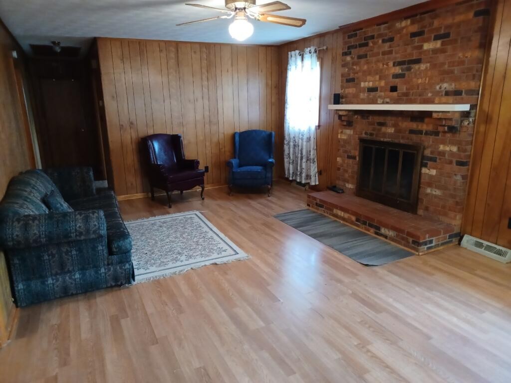 301 Lear Road Portland, TN 37148 - Photo 6 of 19 a living room with furniture and a fireplace