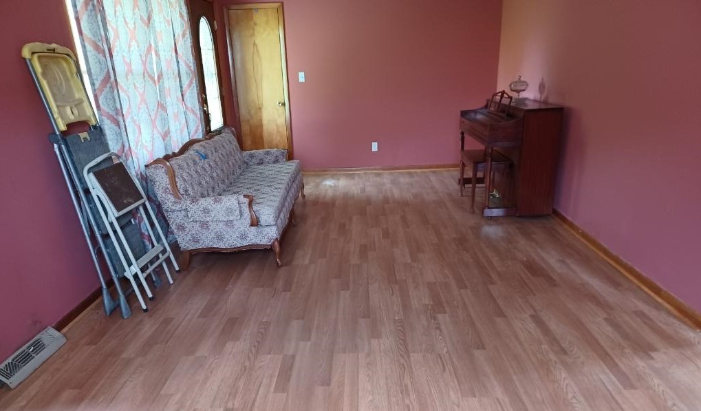 301 Lear Road Portland, TN 37148 - Photo 7 of 19 wooden floor and chair
