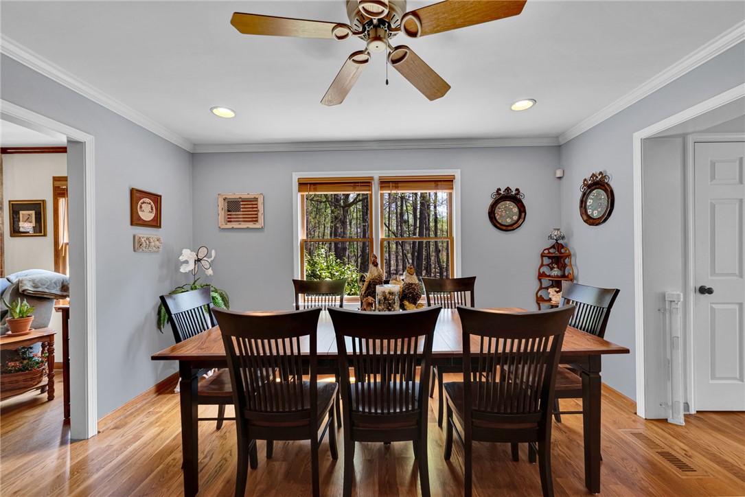 1010 Ridgeview Drive Pendleton, SC 29670 - Photo 12 of 47 This dining area features rich wood flooring, crown molding, and recessed lighting.
