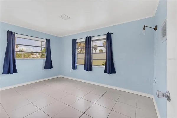 an empty room with windows