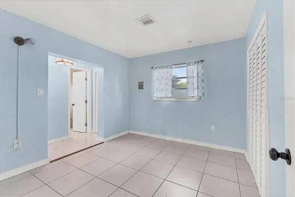 a view of an empty room with window