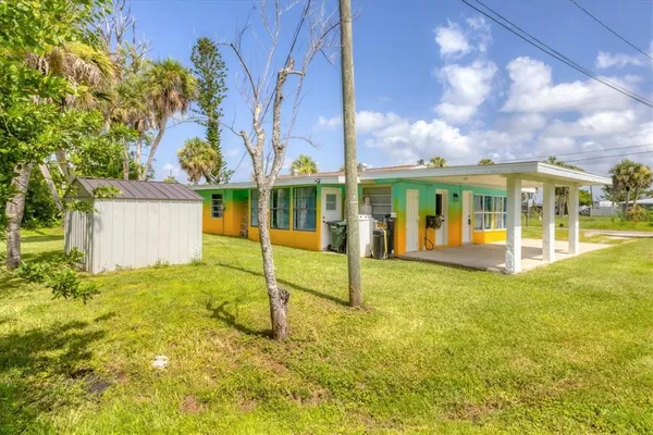 front view of house with a big yard