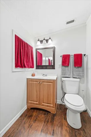 a bathroom with a shower and a sink