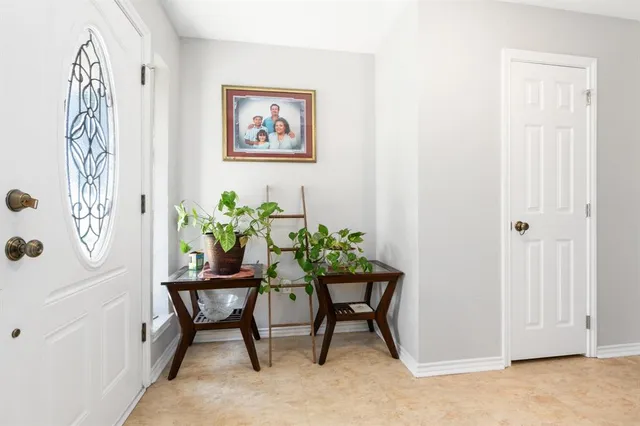 a view of a livingroom with table and chair