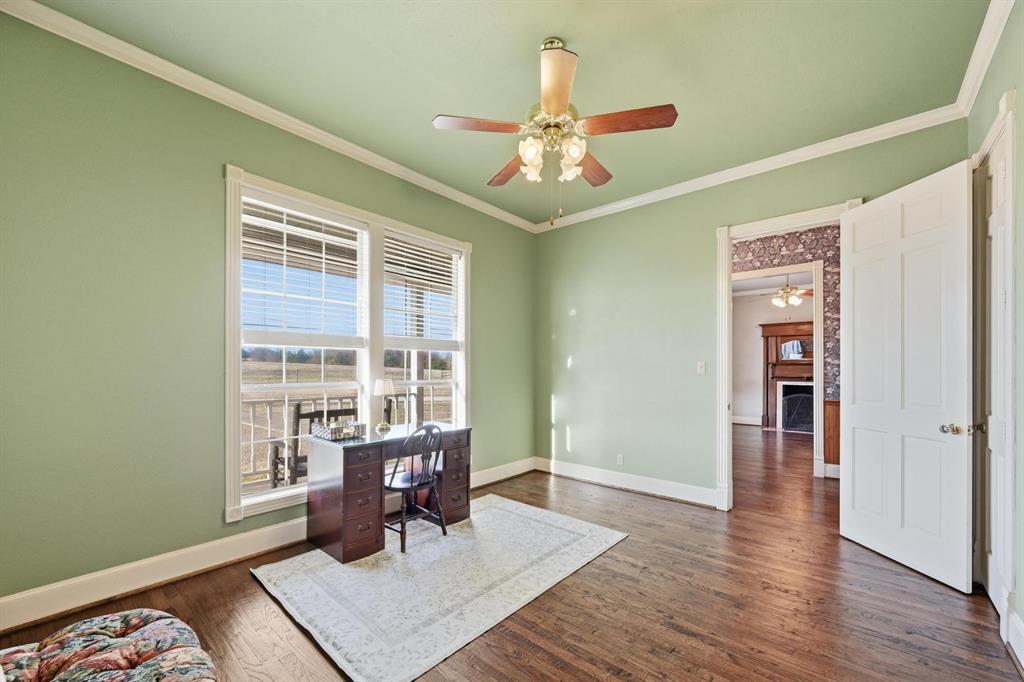 707 Cullins Road Rockwall, TX 75032 - Photo 15 of 40 a workspace with wooden floor