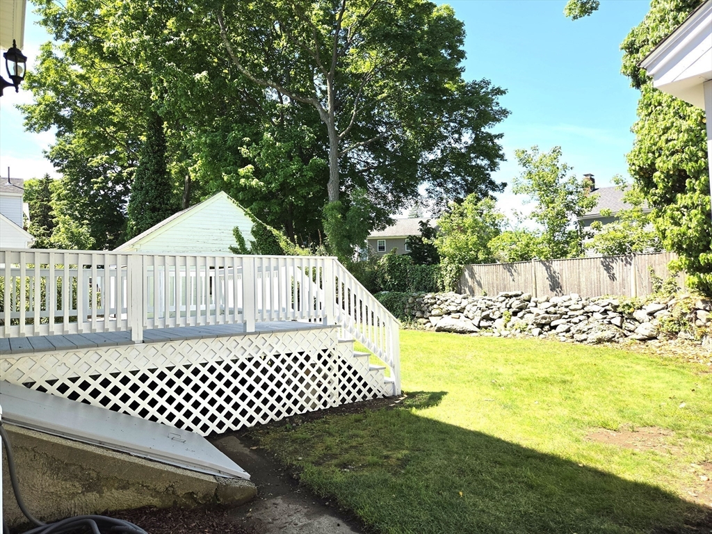 25 Waldeck Road Milton, MA 02186 - Photo 32 of 34 a view of a deck with a yard