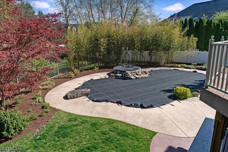 1 Brodziak Road Denville, NJ 07834 - Photo 33 of 42 a view of a backyard with sitting area