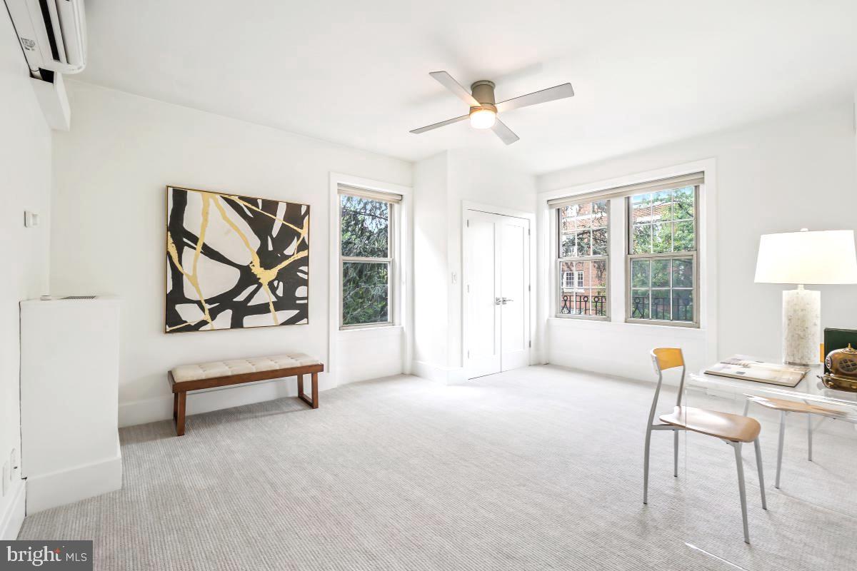 1910 Kalorama Road Northwest, Unit 403 Washington, DC 20009 - Photo 21 of 52 a living room with furniture and a window